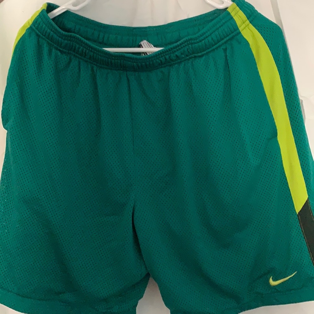Green Nike shorts